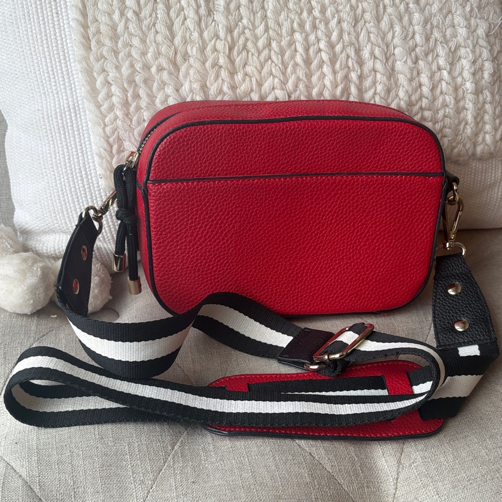 Red pebbled Crossbody Bag with Black and White Strap